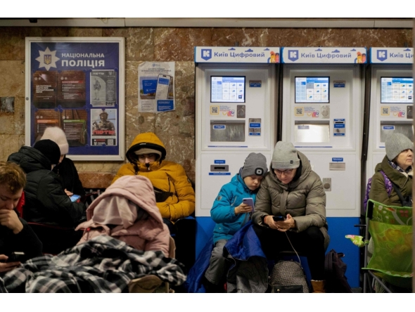 Local residents take shelter in a metro station during an air strike alarm in Kyiv, on November 28, 2024, amid the Russian invasion of Ukraine. (Photo by Tetiana Dzhafarova / AFP)
