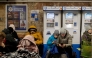 Local residents take shelter in a metro station during an air strike alarm in Kyiv, on November 28, 2024, amid the Russian invasion of Ukraine. (Photo by Tetiana Dzhafarova / AFP)
