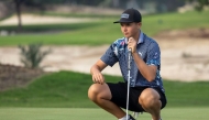 Team Qatar’s Daniil Sokolov lines up a putt at International Series Qatar, the ninth of 10 elevated events on the Asian Tour. 