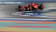 Ferrari's Monegasque driver Charles Leclerc drives during the first practice session of the Formula One Qatar Grand Prix at the Lusail International Circuit on November 29, 2024. (Photo by Mahmud Hams / AFP)