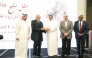 Chairman of the Board of the Medicare Group and Al-Ahli Hospital H E Sheikh Abdullah bin Thani Al Thani (centre) presenting an award to Sir Magdi Yacoub at the event.