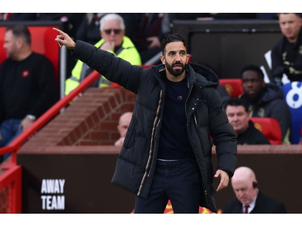 Manchester United's Portuguese head coach Ruben Amorim gestures on the touchline during the English Premier League football match between Manchester United and Everton at Old Trafford in Manchester, north west England, on December 1, 2024. (Photo by Darren Staples / AFP)