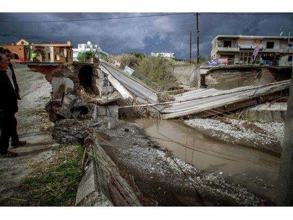 This photograph shows a collapsed bridge in Rhodes island after heavy rainfall, on Decembber 1, 2024. (Photo by Stringer / Eurokinissi / AFP)