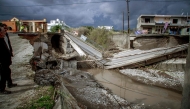 This photograph shows a collapsed bridge in Rhodes island after heavy rainfall, on Decembber 1, 2024. (Photo by Stringer / Eurokinissi / AFP)