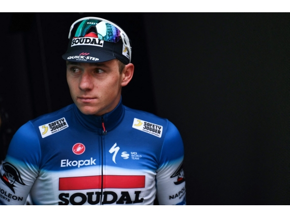 Soudal Quick-Step team's Belgian rider Remco Evenepoel looks on at the podium area after placing second in the 118th edition of the Giro di Lombardia (Tour of Lombardy), a 252km cycling race from Bergamo to Como on October 12, 2024. Photo by Marco BERTORELLO / AFP