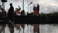 US President Joe Biden speaks as members of his security detail look on while visiting the National Slavery Museum in Morro da Cruz, near Luanda, on December 3, 2024. (Photo by Andrew Caballero-Reynolds / AFP)