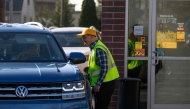 Customers use the drive-thru at the Altoona McDonald's on East Plank Road where murder suspect Luigi Mangione was identified and later arrested on December 9, 2024 in Altoona, Pennsylvania. Photo by JEFF SWENSEN / GETTY IMAGES NORTH AMERICA / Getty Images via AFP