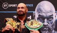 (FILES) World Boxing Council (WBC) heavyweight title holder Britain's Tyson Fury takes part in an pre-fight press conference at Wembley Stadium in west London, on April 20, 2022. (Photo by Adrian DENNIS / AFP)
