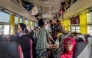 People displaced by conflict ride aboard a bus from Port Sudan in northeastern Sudan on January 7, 2025 to return home to the southern city of Singah in Sennar province, which was retaken by the Sudanese army forces from the Rapid Support Forces (RSF) in November 2024. (Photo by AFP)
