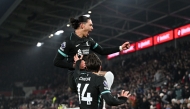 Liverpool's Uruguayan striker #09 Darwin Nunez celebrates after scoring his team second goal during the English Premier League football match between Brentford and Liverpool at the Gtech Community Stadium in London on January 18, 2025. (Photo by JUSTIN TALLIS / AFP)