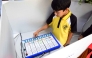 A student casting his vote.