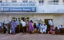 People seek medical care at a hospital in Wad Madani, which was retaken by the Sudanese army a month earlier, in Sudan's al-Jazira state on February 11, 2025. (Photo by AFP)