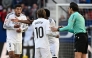 Real Madrid's English midfielder #05 Jude Bellingham reacts to being presented a red card by Spanish referee Munuera Montero during the Spanish league football match between CA Osasuna and Real Madrid CF at El Sadar Stadium in Pamplona on February 15, 2025. (Photo by ANDER GILLENEA / AFP)
