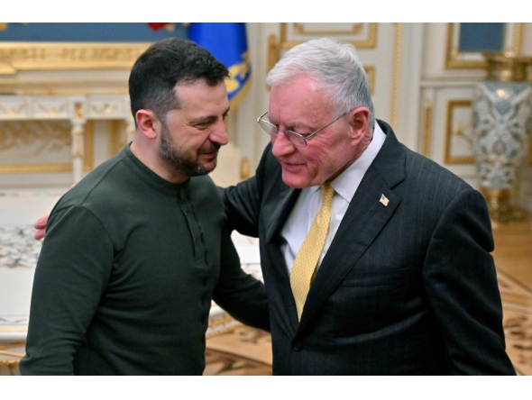  Ukraine's President Volodymyr Zelensky (left) greets US envoy Keith Kellogg at his offices in Kyiv on February 20, 2025. (Photo by Sergei Supinsky / AFP)