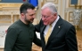  Ukraine's President Volodymyr Zelensky (left) greets US envoy Keith Kellogg at his offices in Kyiv on February 20, 2025. (Photo by Sergei Supinsky / AFP)