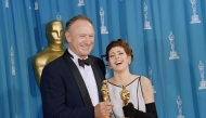 This photograph taken on March 29, 1993, shows US actor Gene Hackman (L) and US actress Marisa Tomei posing with their oscars shortly after being respectively awarded best supporting actor and best supporting actress in Los Angeles. Photo by Scott FLYNN / AFP