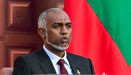 Maldives' President Mohamed Muizzu looks on after reading the oath during his inauguration ceremony in Male on November 17, 2023. (Photo by Ishara S. Kodokara / AFP)