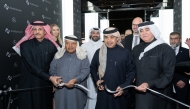 Minister of Finance H E Ali bin Ahmed Al Kuwari cutting the ribbon at the grand opening of new showroom alongside Chairman of Al-Faisal Holding Sheikh Faisal bin Qassim Al Thani; Chairman of the Board of Directors of Qatar International Islamic Bank and Chairman of Ezdan Holding Group Sheikh Dr. Khalid bin Thani bin Abdullah Al Thani; and Chairman of NBK Group Sheikh Nawaf bin Nasser bin Khaled Al Thani. 