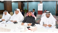 QC Acting General Manager, Ali Saeed Bu Sharbak Al Mansouri with other officials during the meeting.