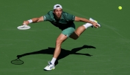 Tallon Griekspoor of the Netherlands plays a forehand against Alexander Zverev of Germany in their second round match during the BNP Paribas Open at Indian Wells Tennis Garden on March 07, 2025 in Indian Wells, California. Clive Brunskill/Getty Images/AFP (Photo by CLIVE BRUNSKILL / GETTY IMAGES NORTH AMERICA / Getty Images via AFP)
