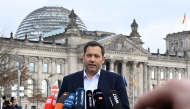 Chairman of the Germany's Social Democratic Party (SPD) Lars Klingbeil gives a statement on March 14, 2025 in front of the Reichstag in Berlin. Photo by RALF HIRSCHBERGER / AFP.