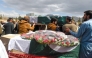 People carry the coffins of railwaymen killed by armed militants who ambushed a train in the remote mountainous area of Balochistan province, during their funeral in Quetta on March 13, 2025. (Photo by Banaras KHAN / AFP)
