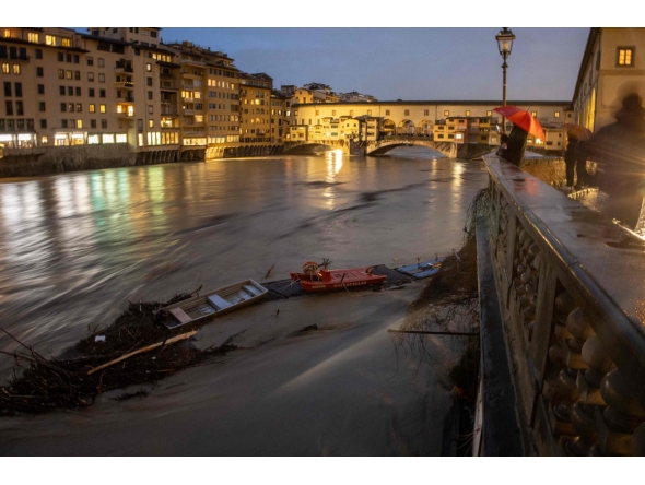 A general view shows the high level of the Arno River near the Ponte Vecchio in Florence, on March 14, 2025. (Photo by Federico SCOPPA / AFP)
