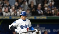 Los Angeles Dodgers' Shohei Ohtani prepares to bat in the exhibition baseball match between the Los Angeles Dodgers and Yomiuri Giants during the MLB Tokyo Series at the Tokyo Dome in Tokyo on March 15, 2025. (Photo by Philip FONG / AFP)
 