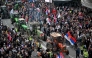 Farmers join protesters as they arrive in the capital from cities across Serbia, to take part in the largest protest since the anti-graft movement, in downtown Belgrade on March 15, 2025. (Photo by Andrej Isakovic / AFP)