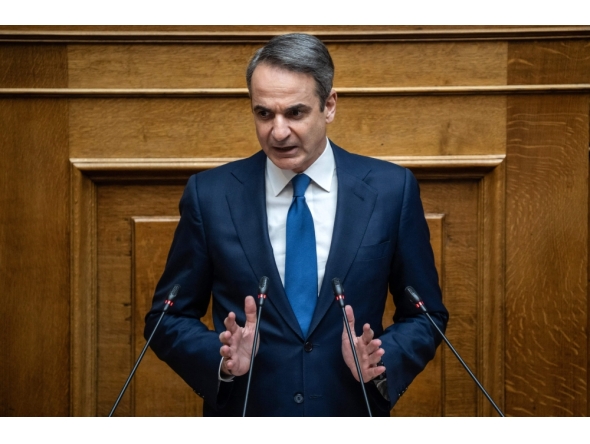 (Files) Greek Prime Minister Kyriakos Mitsotakis addresses the audience at the Greek Parliament in Athens, on March 5, 2025. (Photo by Angelos Tzortzinis / AFP)