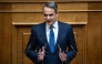 (Files) Greek Prime Minister Kyriakos Mitsotakis addresses the audience at the Greek Parliament in Athens, on March 5, 2025. (Photo by Angelos Tzortzinis / AFP)