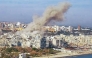 This handout picture released by the Syrian Arab News Agency (SANA) shows smoke billowing over the coastal city of Latakia after an explosion on March 15, 2025. (Photo by SANA / AFP) 