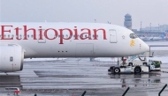 An Airbus A350-941 aircraft of Ethiopian Airlines is pulled by a pushback tractor of air service provider DNATA at Zurich Airport near Ruemlang, Switzerland, December 14, 2022. (REUTERS/Arnd Wiegmann)