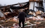 Denise Woodard looks over her destroyed trailer inside of Harmony Hills trailer park on March 15, 2025 in Poplar Bluff, Missouri. (Photo by Brad Vest / GETTY IMAGES NORTH AMERICA / Getty Images via AFP)
