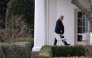 US President Donald Trump walks to the Oval Office at the White House in Washington, DC, on March 14, 2025 after speaking at the Justice Department. (Photo by ROBERTO SCHMIDT / AFP)