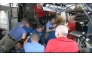 This screengrab made from a NASA livestream shows the SpaceX Dragon Crew-10 members, including NASA astronauts Anne McClain and Nichole Ayers, JAXA (Japan Aerospace Exploration Agency) astronaut Takuya Onishi, and Roscosmos cosmonaut Kirill Peskov, greeting International Space Station crew members including NASA astronauts Butch Wilmore (L) and Suni Williams (3R) on March 16, 2025. (Photo by NASA / AFP) 