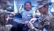 This handout picture released on March 15, 2025, by the Peruvian Navy shows Peruvian fisherman Maximo Napa, 61, receiving medical attention upon his arrival in Paita, Piura department, Peru. Photo by Handout / PERUVIAN NAVY / AFP