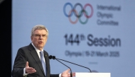 Outgoing International Olympic Committee (IOC) President Thomas Bach delivers a speach during the Opening ceremony of the 144th IOC Session at the Ancient Olympia archeological site, birthplace of the ancient Olympics in southern Greece, on March 18, 2025. (Photo by Fabrice COFFRINI / AFP)