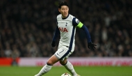 Tottenham Hotspur's South Korean striker #07 Son Heung-Min runs with the ball during the UEFA Europa League Last 16 Second Leg football match between Tottenham Hotspur and AZ Alkmaar at the Tottenham Hotspur Stadium in London, on March 25, 2025. (Photo by Glyn KIRK / AFP)
