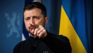 Ukrainian President Volodymyr Zelensky gestures as he addresses a press conference with the Norwegian Prime Minister in the government's representative building in Oslo, Norway on March 20, 2025. (Photo by Ole Berg-Rusten / NTB / AFP) / Norway OUT
