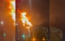 This frame grab taken from a UGC video shot and posted on X on March 21, 2025 by @fire_at_Vill shows a fire burning at a neighborhood electrical substation supplying power to Heathrow Airport in Hayes, west London. Photo by Handout / Courtesy of X user @fire_at_Vill / AFP