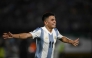 TOPSHOT - Argentina's midfielder #11 Thiago Almada celebrates after scoring during the 2026 FIFA World Cup South American qualifiers football match between Uruguay and Argentina at the Centenario stadium in Montevideo, on March 21, 2025. (Photo by Eitan ABRAMOVICH / AFP)
