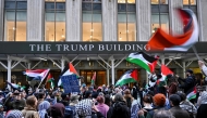 (FILES) People protest during a pro-Palestinian demonstration at the Trump Building in New York on March 19, 2025. (Photo by ANGELA WEISS / AFP)
