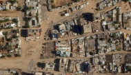 This handout satellite photo obtained from Planet Labs PBC and taken on March 12, 2025 shows the Hagar Qadu Souk (market) in al-Fasher, the capital of Sudan's North Darfur state. (Photo by Planet Labs PBC / AFP)