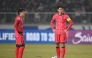 South Korea's Son Heung-min (R) and Lee Kang-in (L) prepare a free kick during the World Cup 2026 Asian qualifier football match between South Korea and Oman in Goyang on March 20, 2025. (Photo by Jung Yeon-je / AFP)
