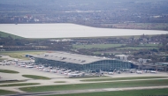 An aerial photograph taken on March 21, 2025 shows planes parked on the tarmac of Heathrow Airport following its closure after a fire broke out at a substation supplying power of the airport, in Hayes, west London. Photo by AFP