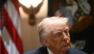 US President Donald Trump looks on during a cabinet meeting in the Cabinet Room of the White House on March 24, 2025, in Washington, DC. (Photo by Brendan SMIALOWSKI / AFP)