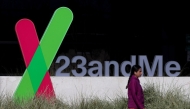 (FILES) A pedestrian walks by a sign posted in front of the 23andMe headquarters on February 1, 2024 in Sunnyvale, California. (Photo by JUSTIN SULLIVAN / GETTY IMAGES NORTH AMERICA / AFP)
