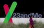 (FILES) A pedestrian walks by a sign posted in front of the 23andMe headquarters on February 1, 2024 in Sunnyvale, California. (Photo by JUSTIN SULLIVAN / GETTY IMAGES NORTH AMERICA / AFP)
