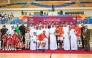 Qatar Basketball Federation President Mohammed Saad Al Mughaiseeb presents the winners' trophy to Al Arabi captain.